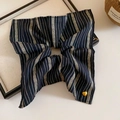 Striped navy blue and beige gray fabric scrunchie with a small gold heart pendant - Scrunchie / Black-Heart