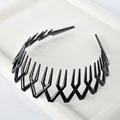 Minimalist black plastic headband with wavy non-slip teeth for secure styling - Shiny Black ABS with Teeth
