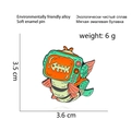 Cartoon TV and fish enamel brooch in mint green and orange made of eco-alloy - Fishbone TV (CC2233)