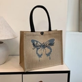 Borsa grande in lino con manici neri e stampa a farfalla blu in finitura juta naturale - Farfalla
