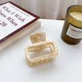 Elegant marble pattern acetate hair claw clip with gold-tone label on a minimal table - Small Off-White-5cm (No Logo)