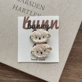 Set of two cute cream lamb hair ties with pearl accents on a white card display - Beige Sheep Hair Clip