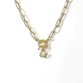Gold paperclip chain necklace featuring a horseshoe pendant inlaid with sparkling zircons - Letter U