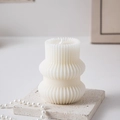 Artistic cream-white ribbed pillar candle on a textured stone tray with pearl decor - Origami Geometric Type I / White