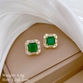 Macro shot of green crystal square earrings with diamond halo on brown jewelry case - S925 Silver Pin + Gold Plated Copper / Square Rhinestone Stud Earrings (F426)