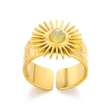 Anello regolabile in titanio dorato con motivo a sole e pietra turchese verde chiaro - Aperto Regolabile / Oro con pietra verde chiaro