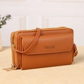 Brown faux leather crossbody bag featuring dual zippers and a stylish flap front pocket - Brown