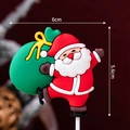 Santa Claus cake topper with green gift bag, 6cm x 5.6cm festive dessert decoration - Soft Glue Santa with Yellow Rope Bag Topper