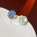 Vintage asymmetric gold earrings with sun and moon enamel designs on ceramic - Blue Sun & Moon (Silver Pin)