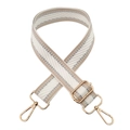 Detail of woven beige and silver strap with premium gold swivel hooks and metal hardware - White