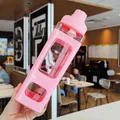 Detail of 900ml pink square plastic sports bottle with straw and capacity markings - Pink (900ml)