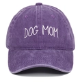 Detailed view of DOG MOM embroidery on washed purple cotton baseball cap fabric - One Size / Purple