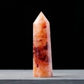 Natural orange quartz crystal pillar with hexagonal pointed tip on a dark background - Red Hematoid Quartz / Single Point 4-5cm