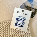 Set of 4 blue floral and solid color snap hair clips on a white presentation card - Style 11-Blue Tones Floral