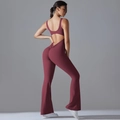 Detailed view of the open back cutout and scrunch butt design on yoga jumpsuit - Burgundy