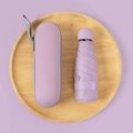 Compact lavender capsule umbrella with matching hard shell storage case and wrist strap - 6-Rib Mini Vinyl Thickened + Capsule Box / Light Purple