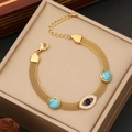 Gold mesh bracelet with turquoise beads and blue devil eye charm on a beige gift box - Turquoise Evil Eye Style (2#)