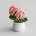 Handmade knitted pink carnation potted plant decoration in a white ceramic pot - 2-Head Carnation Pink