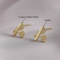Minimalist golden leaf stud earrings in 3 layers gold plated copper on pink silk - Wrapped Style