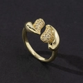Close-up of adjustable gold ring with micro-pave zircon elements and polished finish - Style 3