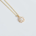 Elegant gold chain necklace featuring a floral pendant with white pearl and shell petals - Pearl Flower