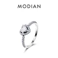 Elegant S925 sterling silver heart-shaped halo ring with pavé-set zircon stones on white background - US Size 5 / Silver