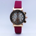 Close-up of rose gold fashion watch with magenta leather strap and flower detail - Rose Gold with Rose Red Strap