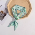 Light green floral silk scarf with yellow and red flowers in a bow tie shape - Light Green Floral