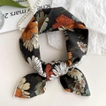 Deep grey floral cotton linen neck scarf with orange daisy print and white stitched edges - Wild Chrysanthemum Black