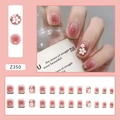 Close-up of pink gradient press-on nails with 3D white daisy floral patterns and French tips - Z350 Fresh Camellia (Glue Style)
