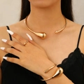 Three-piece gold jewelry set featuring open waterdrop bangles and ring on female model - Bangle + Choker + Ring (76) / Three-Piece Set / KC Gold