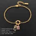 14K gold plated stainless steel bracelet featuring letter and pink zircon pendant - Letter Q