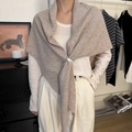 Elegant light brown knitted wool shawl with striped texture and 100% wool label - Oatmeal