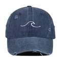 Detail of white wave embroidery and distressed denim fabric on a navy baseball cap - One Size / Navy Blue