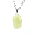 Macro detail of natural light green gemstone pendant on a silver link chain necklace - Silver Olive Green