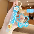 Blue honey bee liquid keychain with sakura cherry blossom charm and golden ring - Sakura - Blue