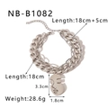 Detailed view of layered silver Cuban chain bracelet with abstract face pendant and size specs - Abstract Face Pendant Double Curb Chain (NB-B1082)