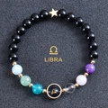 Macro detail of Libra zodiac bracelet with black beads, colorful stones and star pendant - Libra-Obsidian