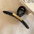 Minimalist large black hair claw clip with gold metal plate and MIN MIN engraving - Gold Cross MIN Style