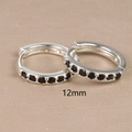 Close-up of 12mm 925 sterling silver hoop earrings with black zircon stone inlay - 12mm Silver Black Rhinestone (E1014-12mm)