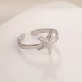 Detailed macro shot of a silver starfish ring with realistic textured ocean theme design - Steel Color Starfish