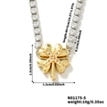 Macro shot of gold clover pendant with cubic zirconia chain and product dimensions - Clover Style (N01175-5)
