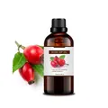 Organic rose hip oil in a 100ml amber glass bottle with fresh rosehip seeds - Rose Hip Oil 100ml