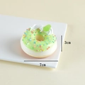 Realistisches grünes Donut Squishy Spielzeug mit bunten Streuseln und Sahne 7cm Durchmesser - Grasgrün
