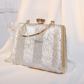Silver pleated evening clutch bag with gold handle and sparkling gemstone clasp - Silver