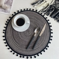Dark grey cotton linen round placemat with fringe pom-poms on a light table - 38cm Placemat / Silver Black Gray