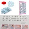 Set of 26 lowercase alphabet cookie cutters in blue and white plastic for baking - Lowercase Letter Style