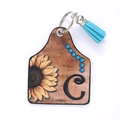 Porte-clés en cuir style western avec tournesol, pompon bleu et lettre C - Lettre C