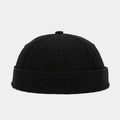Primer plano de gorro docker de algodón negro con textura lavada y borde enrollado - Ajustable / Negro