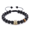 Macro shot of tiger eye bead and zircon letter W charm on black onyx bead bracelet - Letter W-Black Agate Bracelet